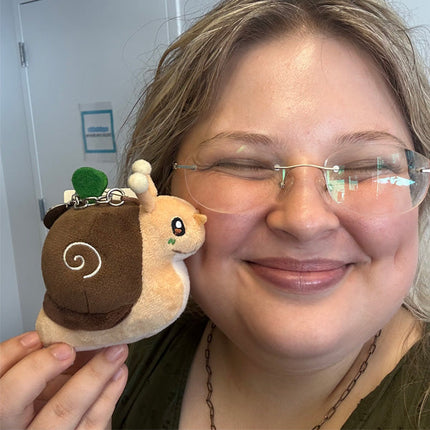 Customer photo of Micro Squishable Garden Snail Keychain